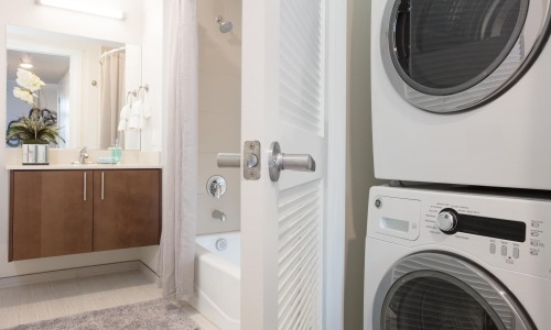 a bathroom with a washer and dryer